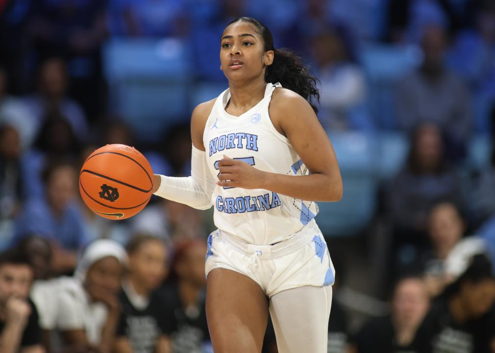 North Carolina Tar Heels guard Deja Kelly brings the ball up court.