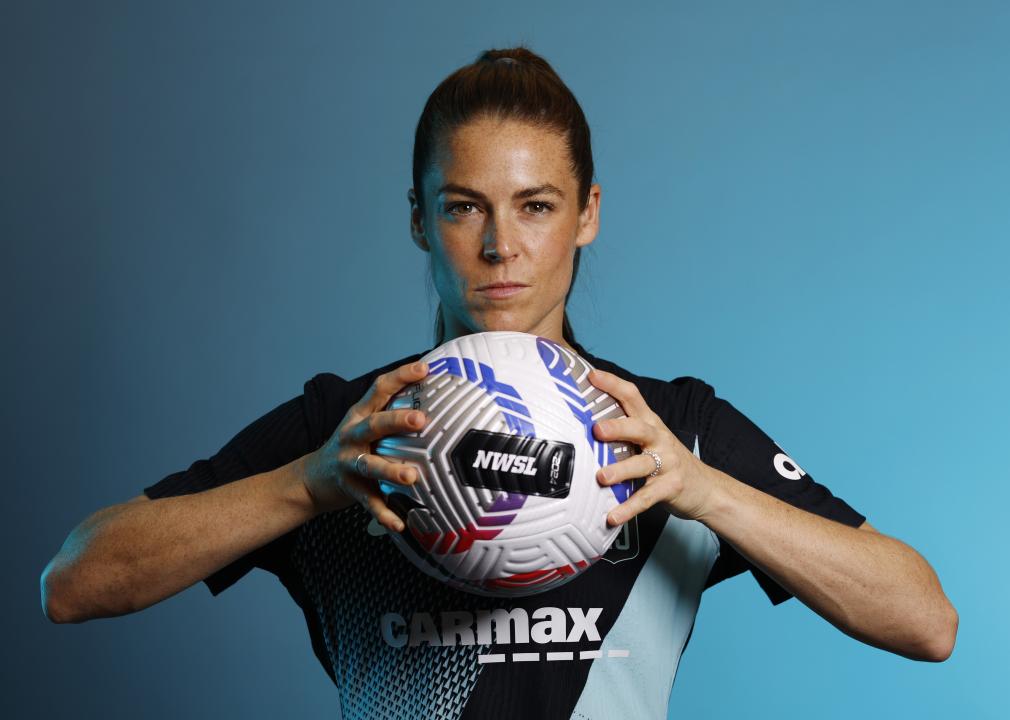 Kelley O'Hara of NJ/NY Gotham FC poses for a portrait, holding a soccer ball, during Media Day.