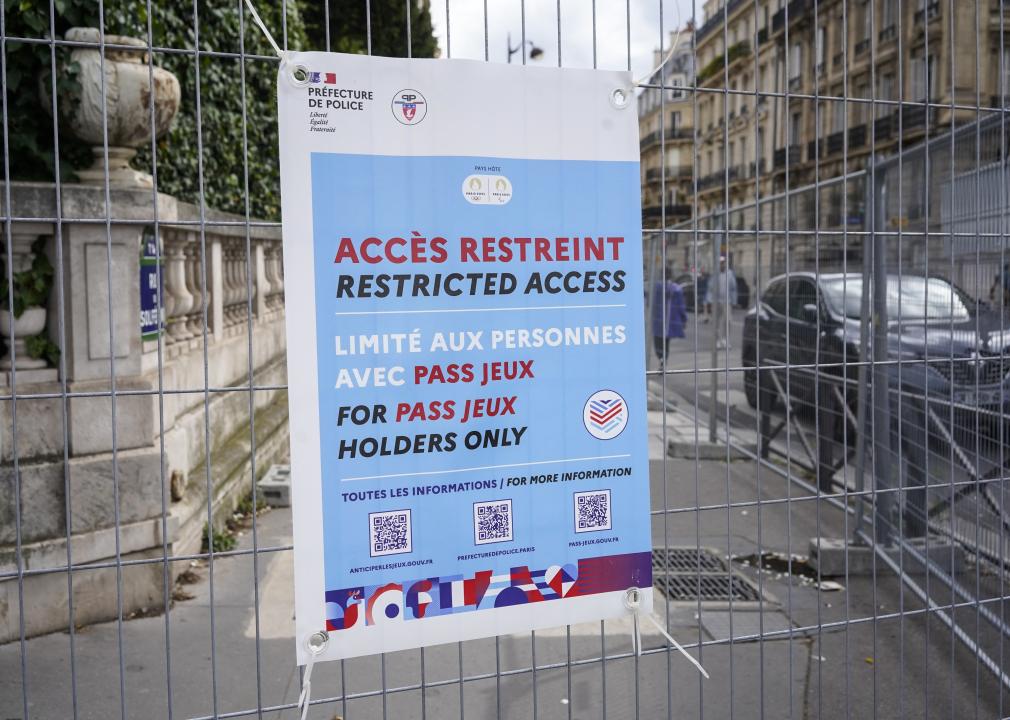 Police Prefecture sign on the gates in Paris with QR codes. 