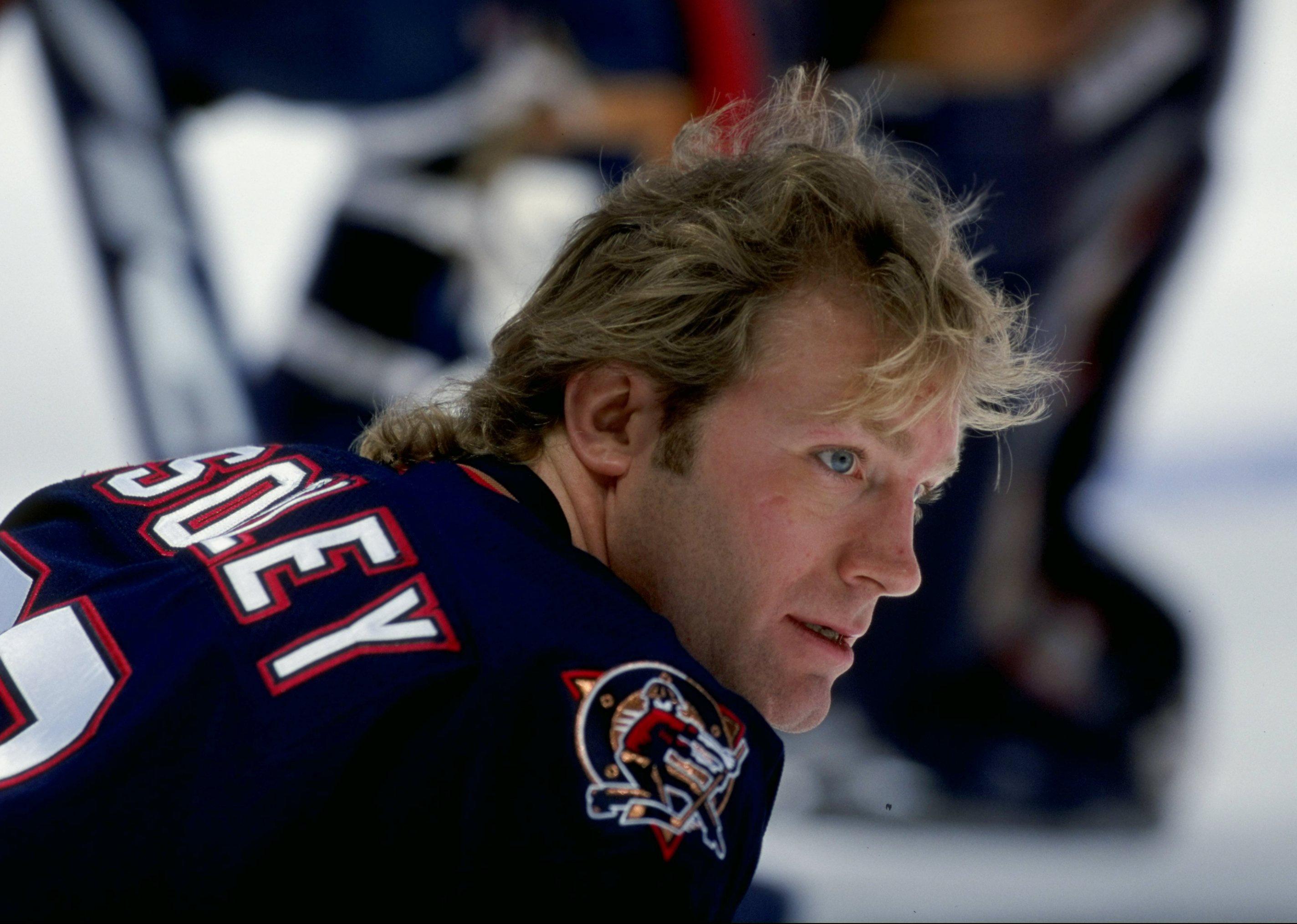 Marty McSorley looks on during a game.