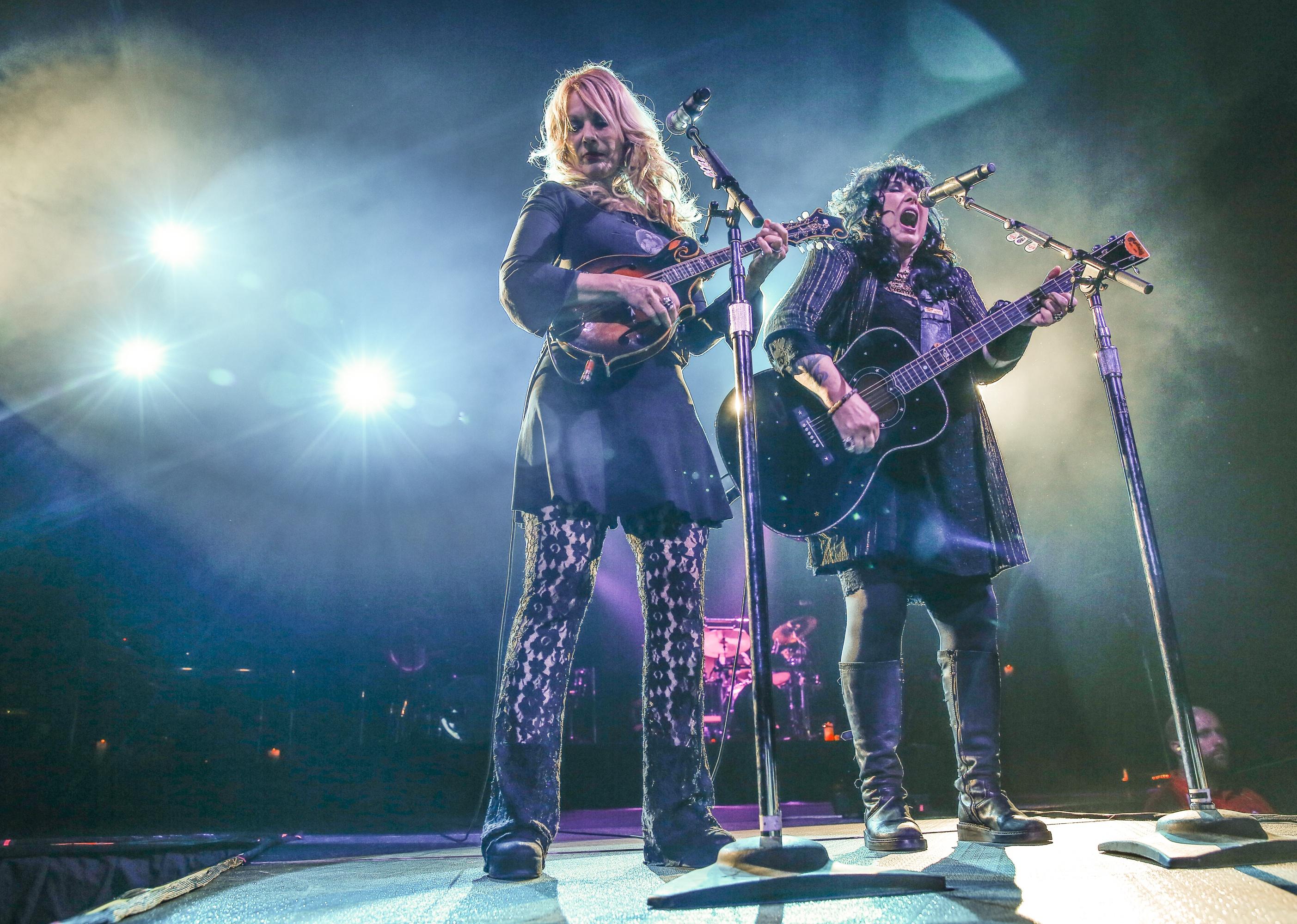 Nancy Wilson and Ann Wilson of Heart performing onstage.