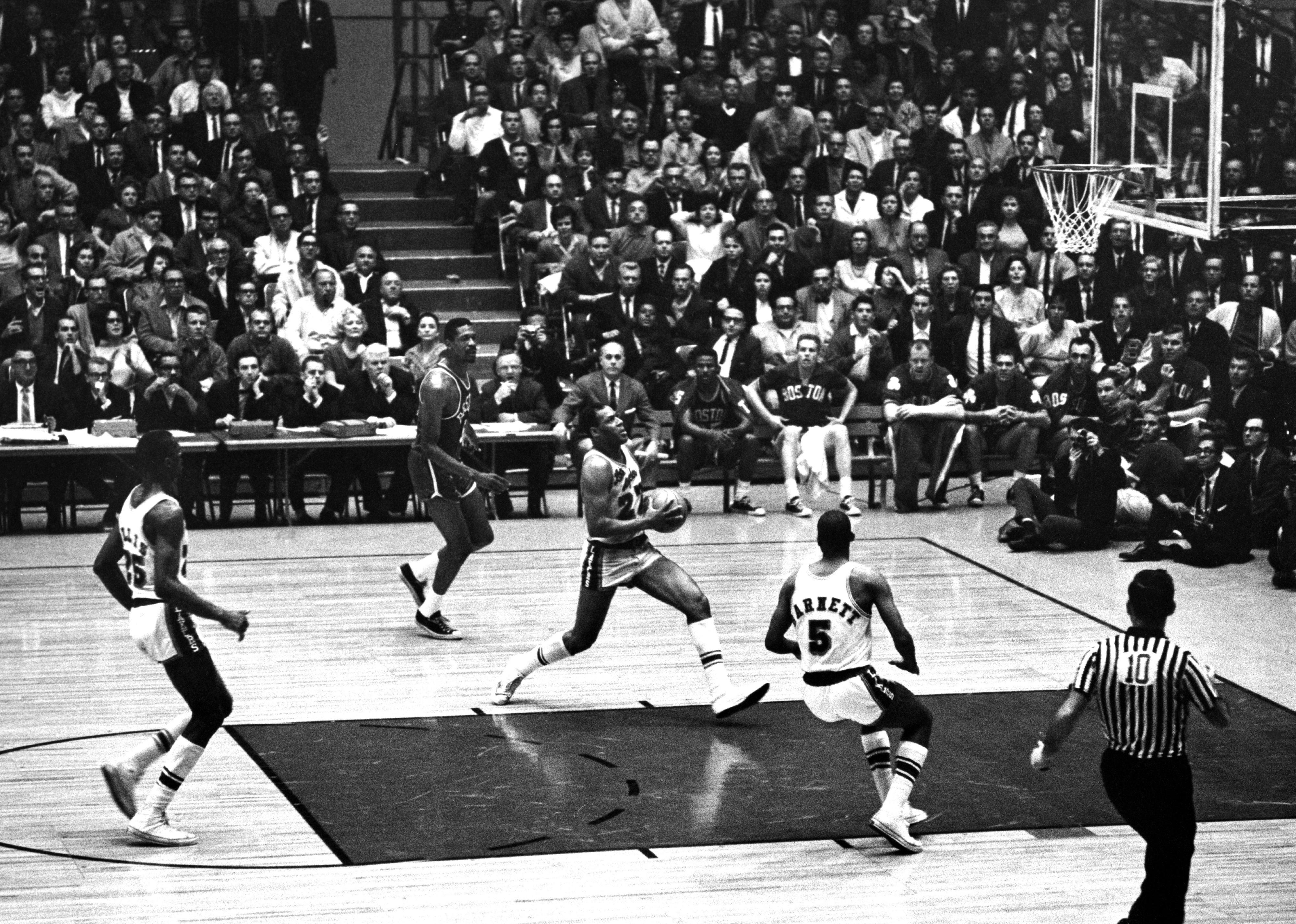 Elgin Baylor of the Los Angeles Lakers goes for the layup during the 1963 NBA Finals.