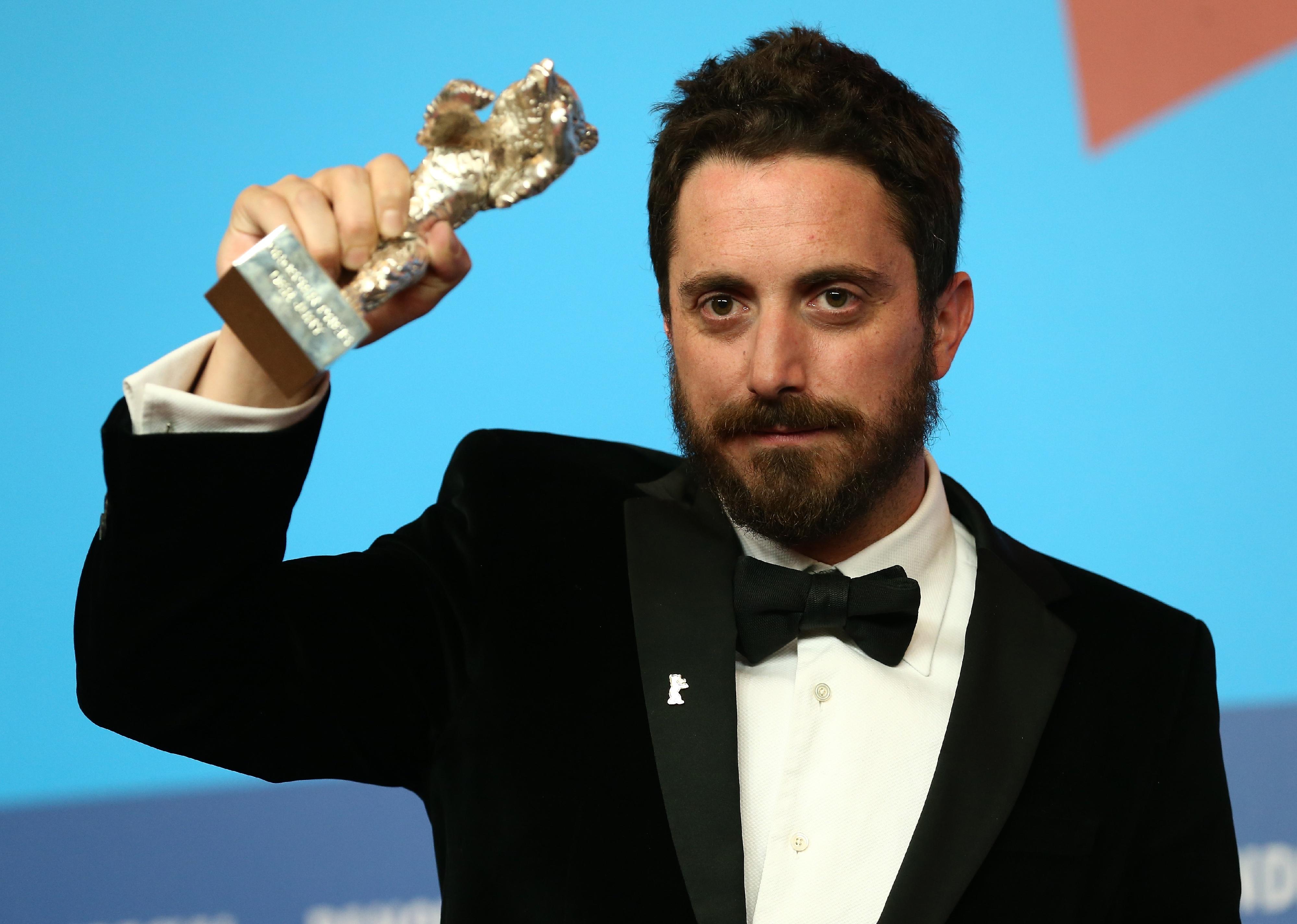 Pablo Larrain is seen with the silver bear for his movie 'El Club' (The Club).