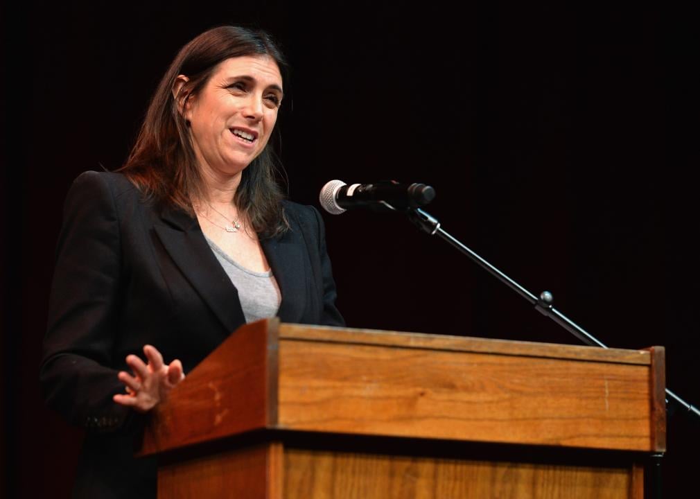 Stacey Sher presenting on stage during an event