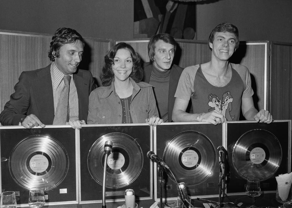 The Carpenters with awards for sales of their album 'Now & Then' and their compilation 'The Singles: 1969-1973'.