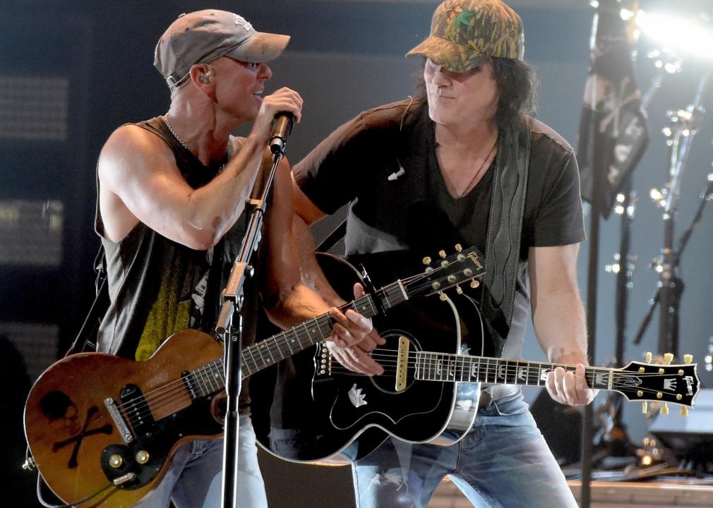 Kenny Chesney and David Lee Murphy perform onstage during Kenny Chesney