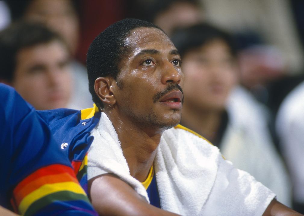 Close up of Alex English of the Denver Nuggets sitting on the bench 