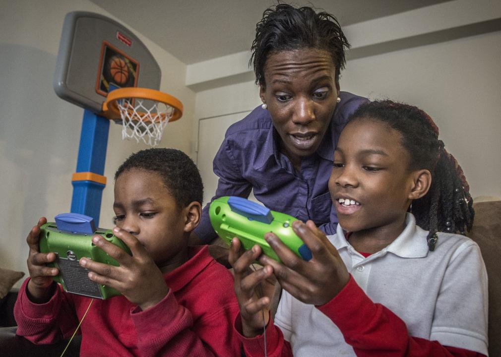 Children play with a donated toy in Washington, DC