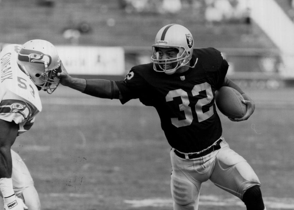 Marcus Allen of the Los Angeles Raiders runs with the ball circa 1980s. 