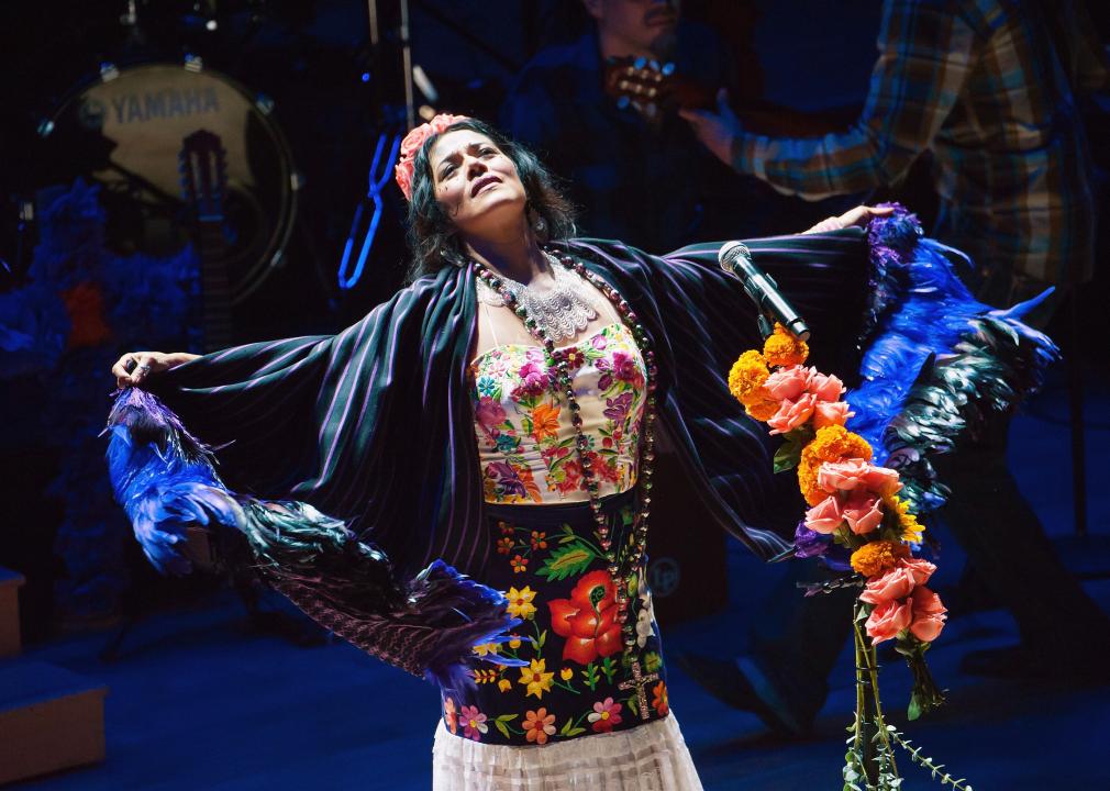 Lila Downs performs on stage.