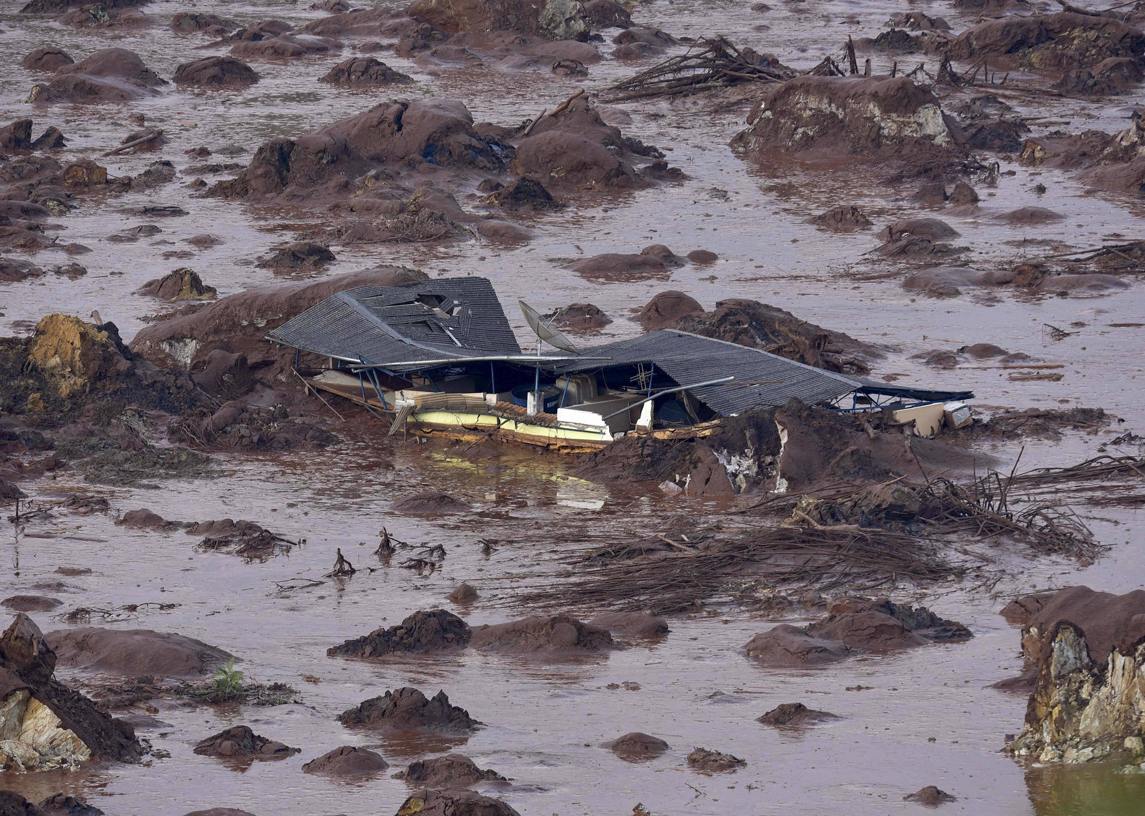 A general view where a dam burst in the village of Bento Rodrigues.