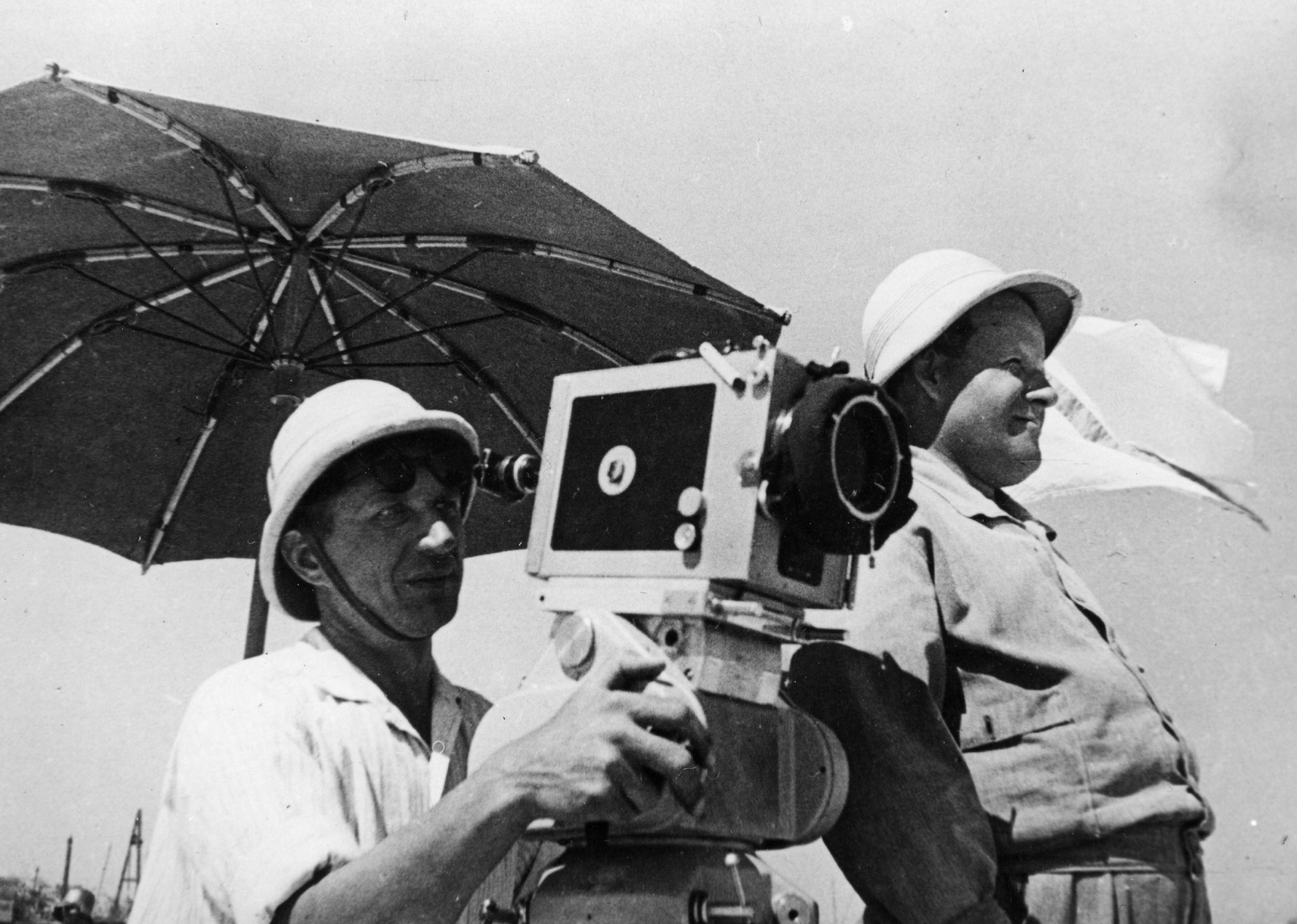 Sergei Eisenstein and his cinematographer E. Tisse shooting on location.