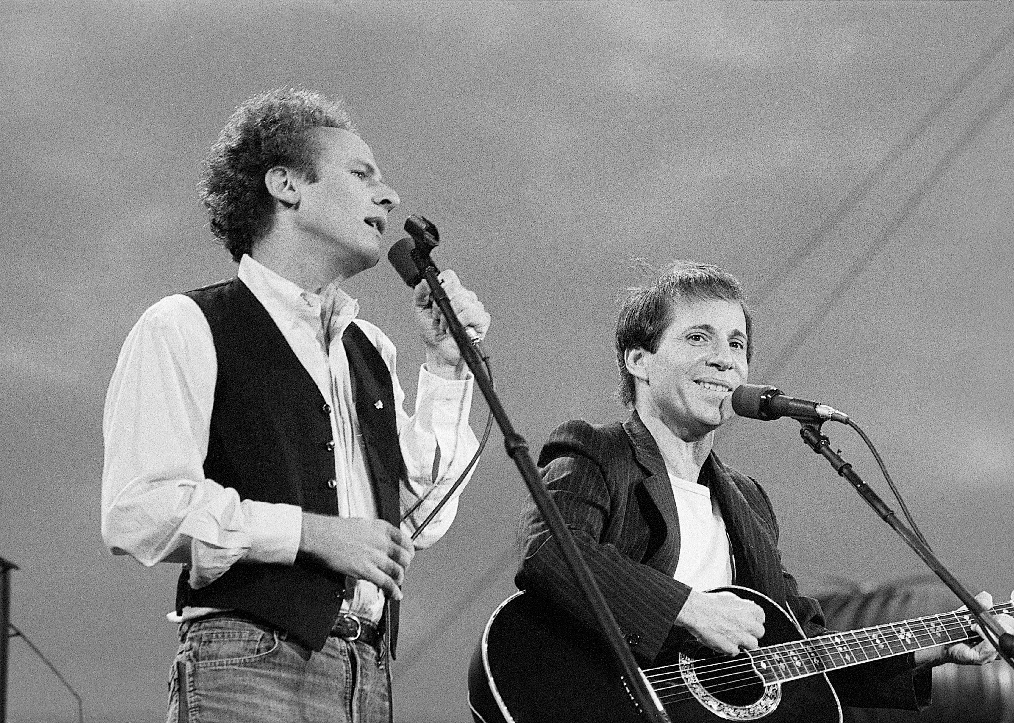 Art Garfunkel and Paul Simon perform for more than 500,000 fans in Central Park.