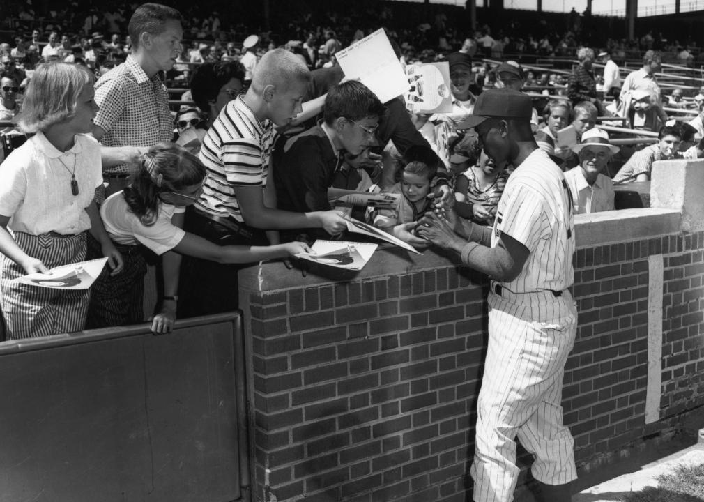 Chicago Cubs player Ernie Banks signs autographs at Wrigley Field