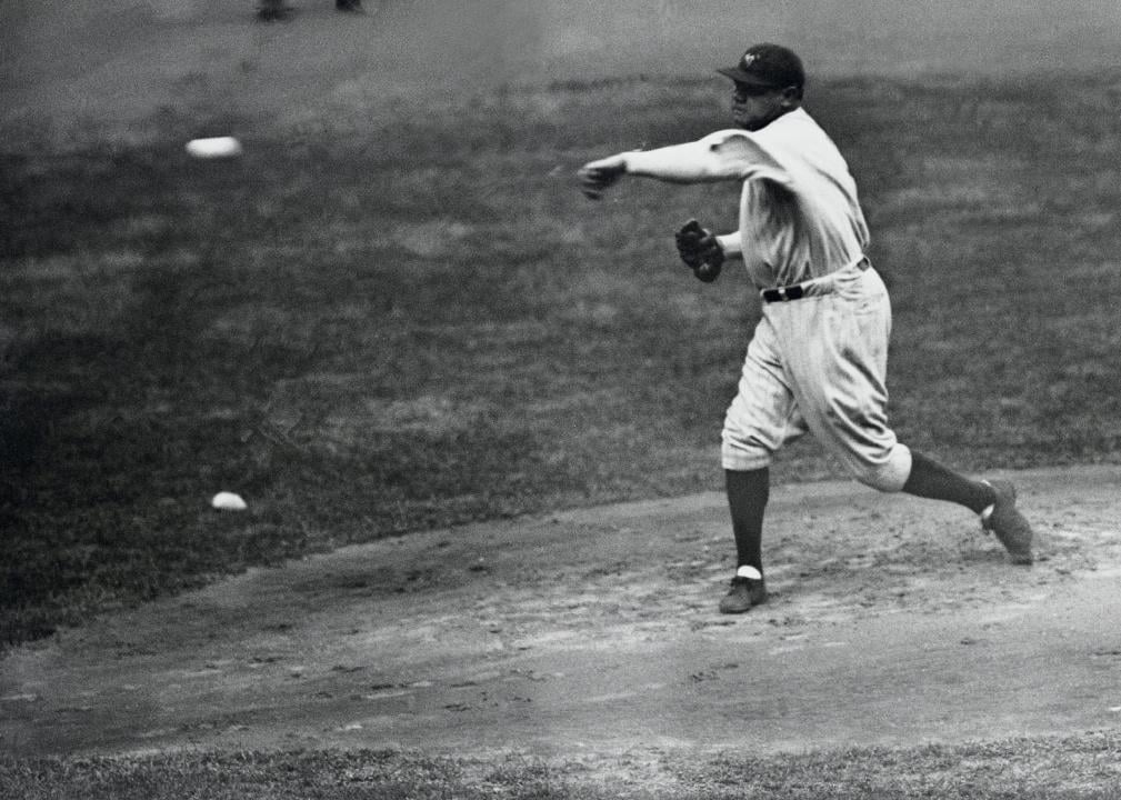 Babe Ruth pitching during a game