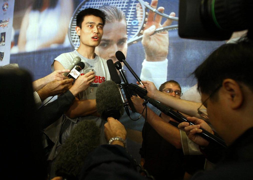 Yao Ming of the Houston Rockets talks with the press.