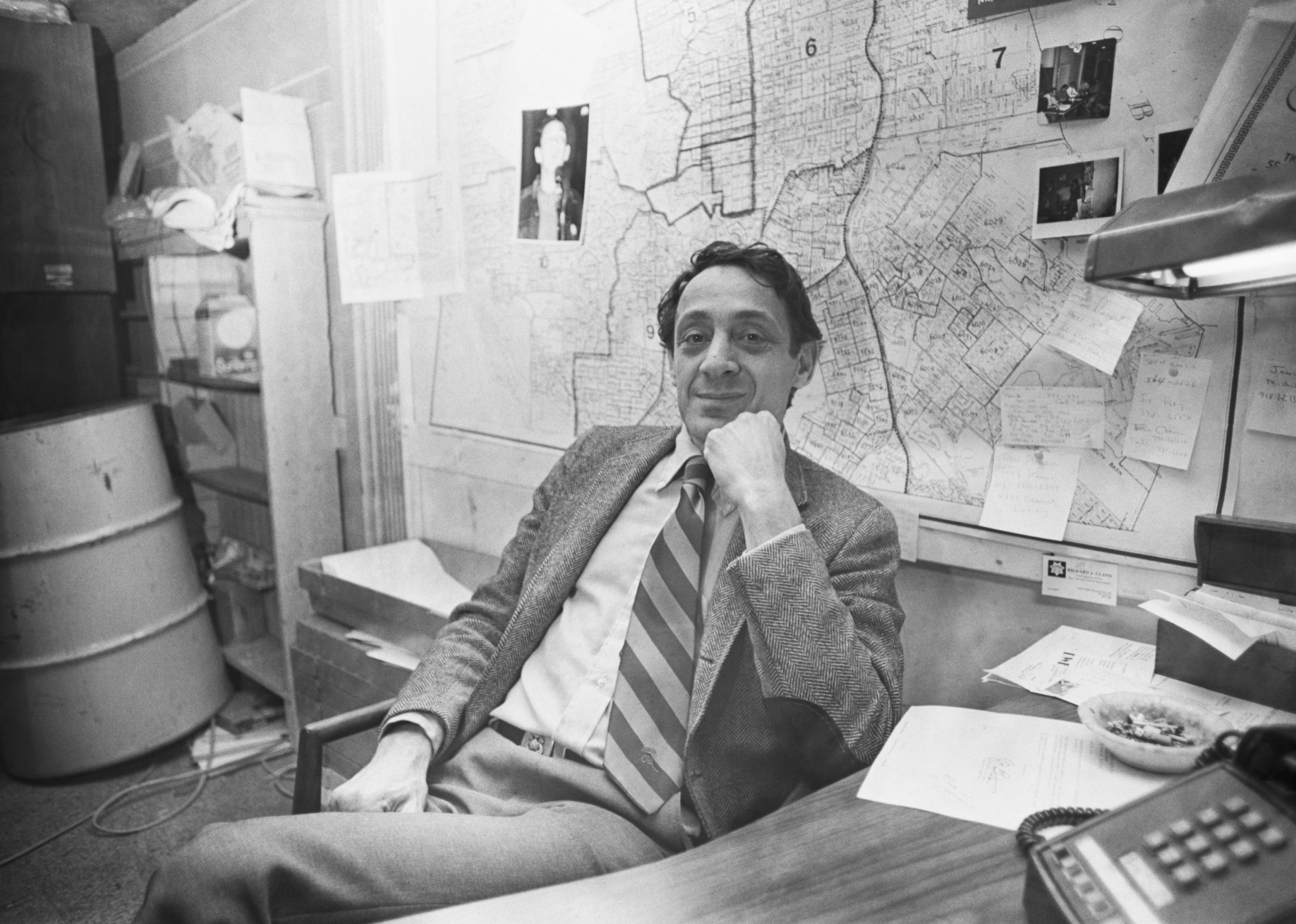 Harvey Milk at a desk.