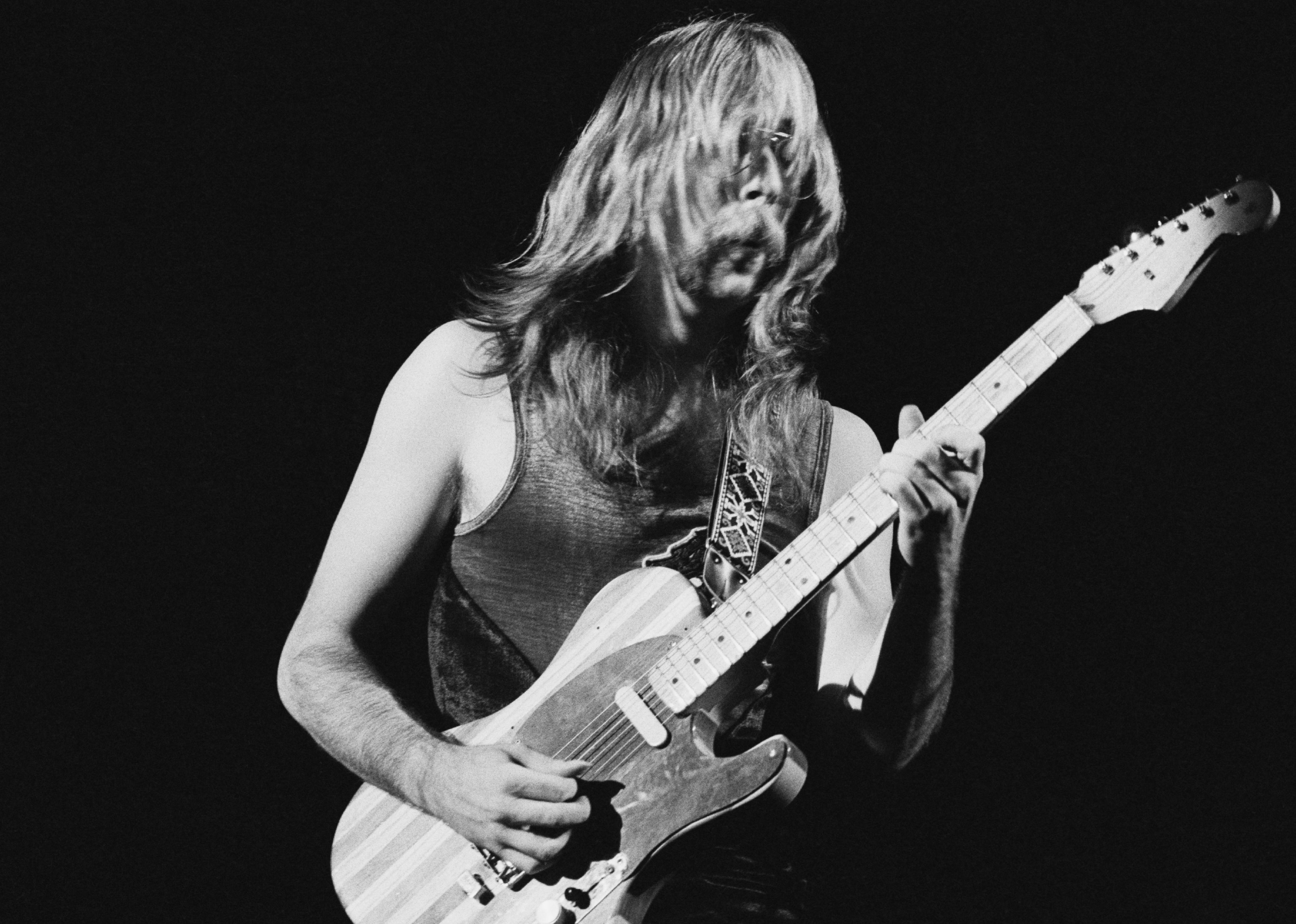 Guitarist Jeff 'Skunk' Baxter performing with Steely Dan at the Rainbow Theatre in London.