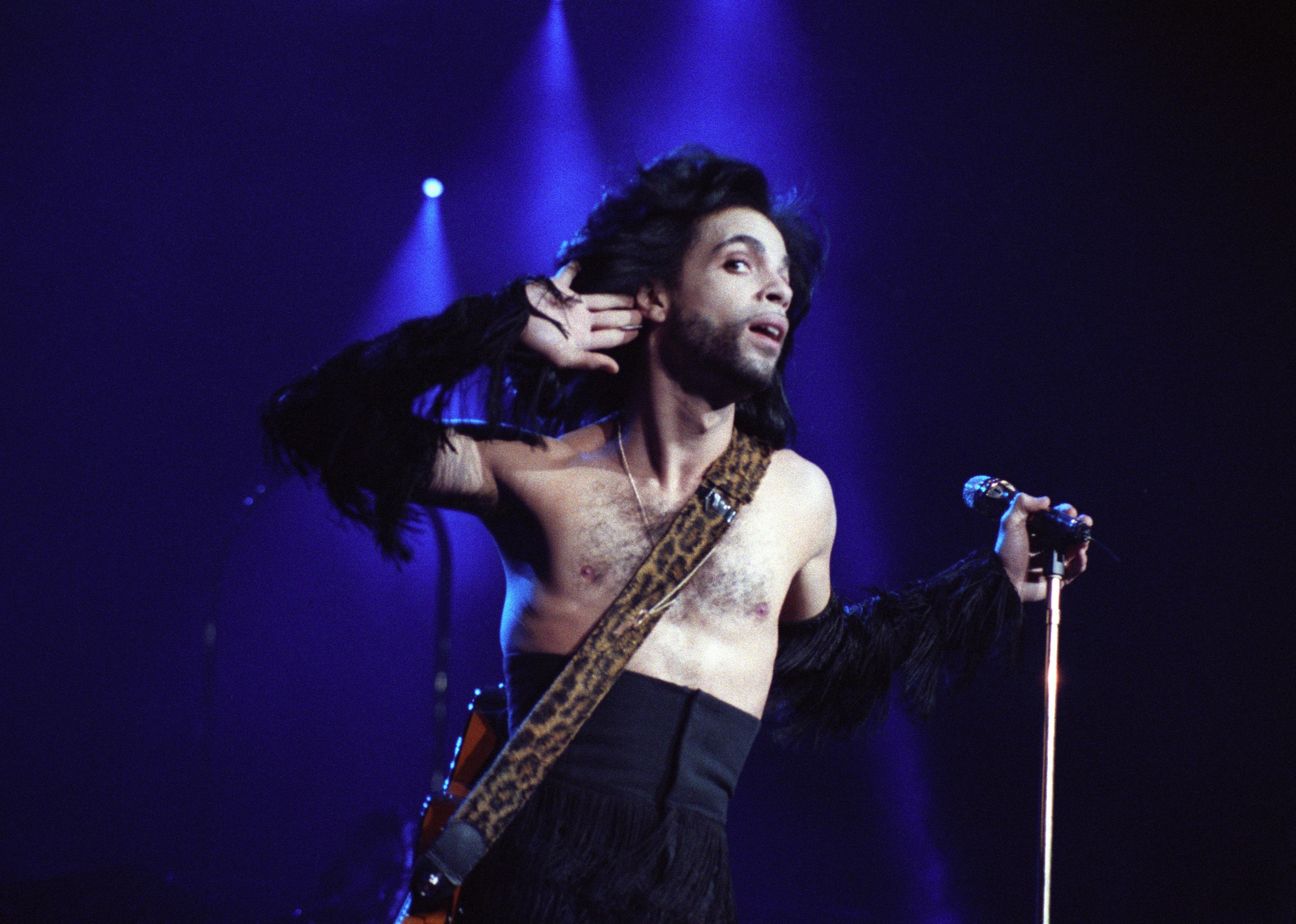 Prince performs during the Nude Tour at the St. Paul Civic Center Arena.