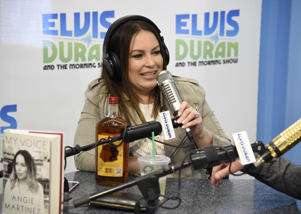 Angie Martinez speaking into the mic at The Elvis Duran Z100 Morning Show.