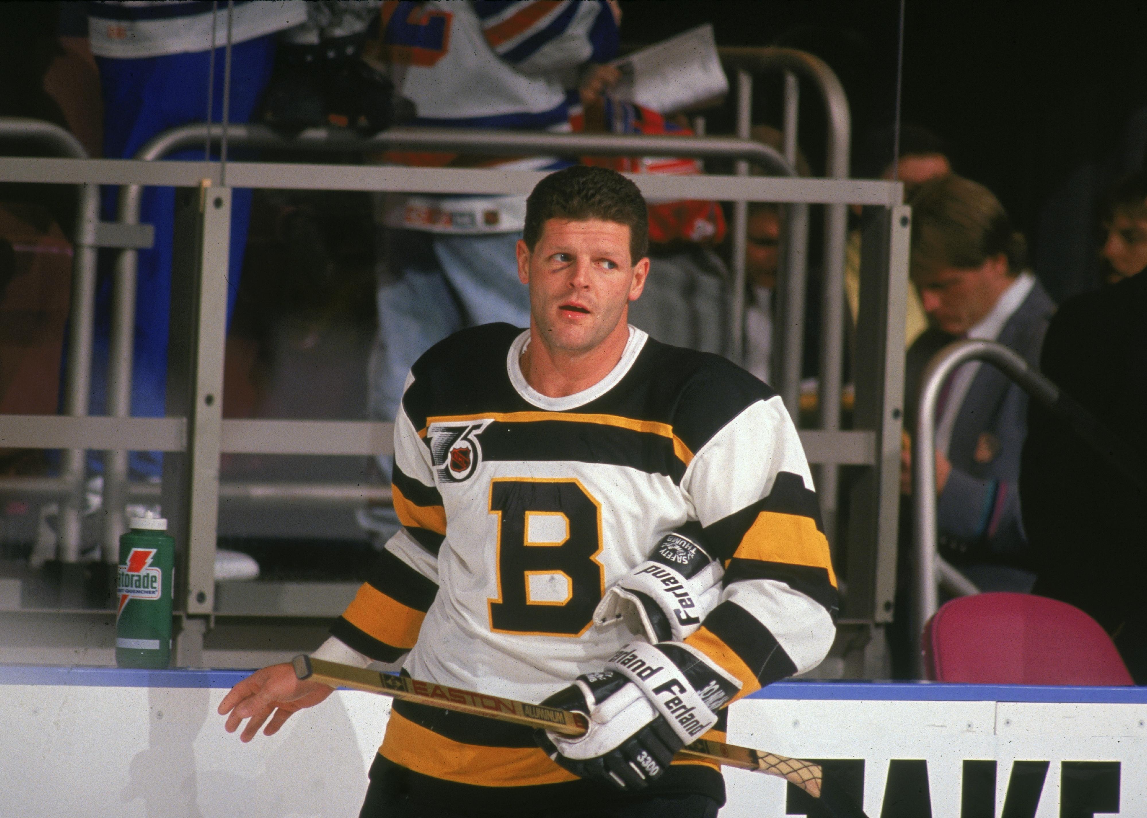 Chris Nilan with a wound under his eye during a game.