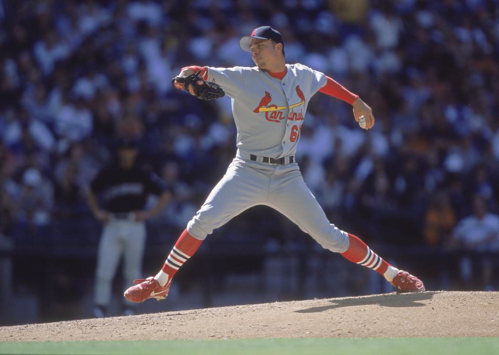 Rick Ankiel winds back to pitch the ball