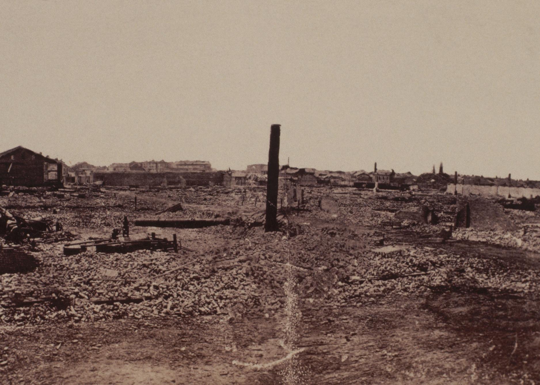 A single post remains erect amid the rubble of a Mobile warehouse.