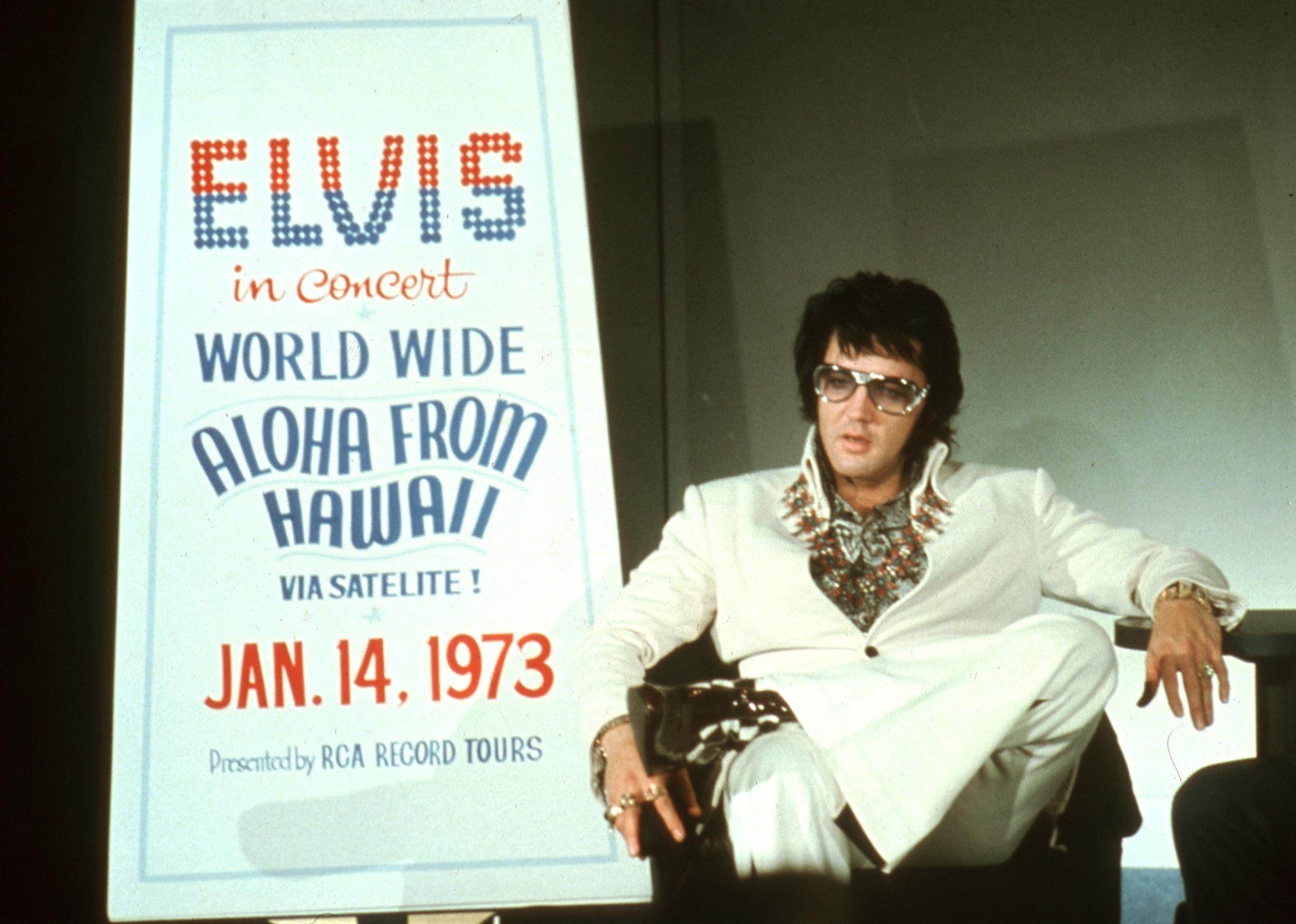 Elvis Presley holds a press conference to announce his upcoming concert 