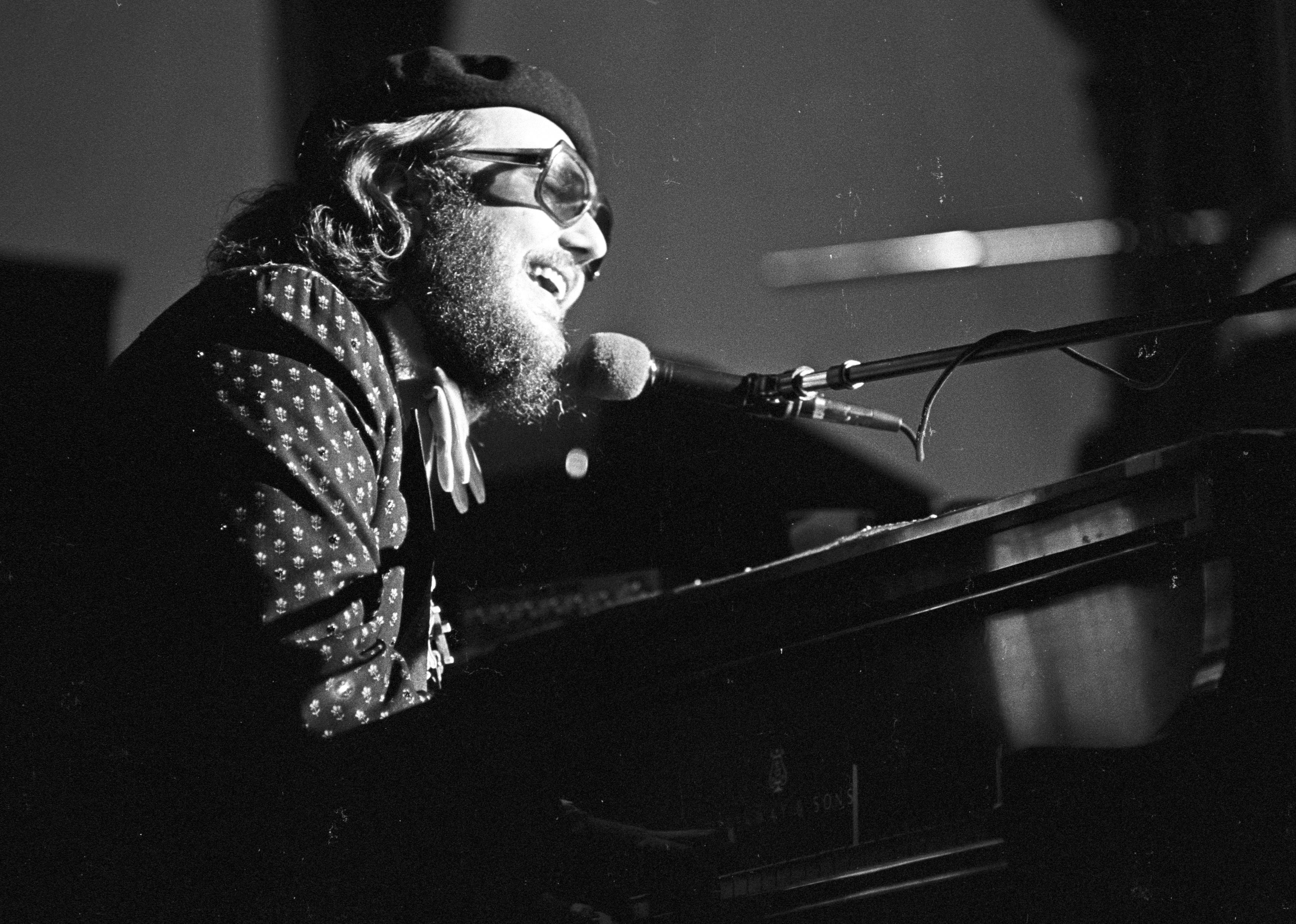 Dr. John performs on stage at The Band's 'The Last Waltz' concert.