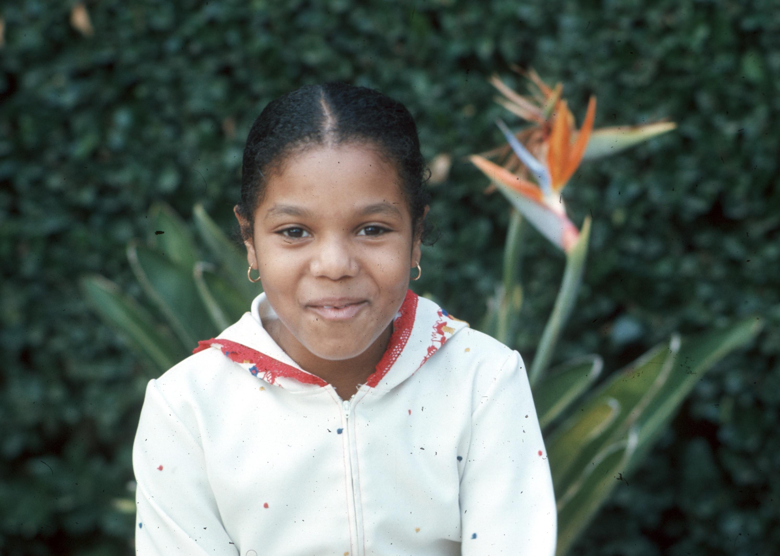 Janet Jackson poses for a portrait at the Jackson family home in January 1977.