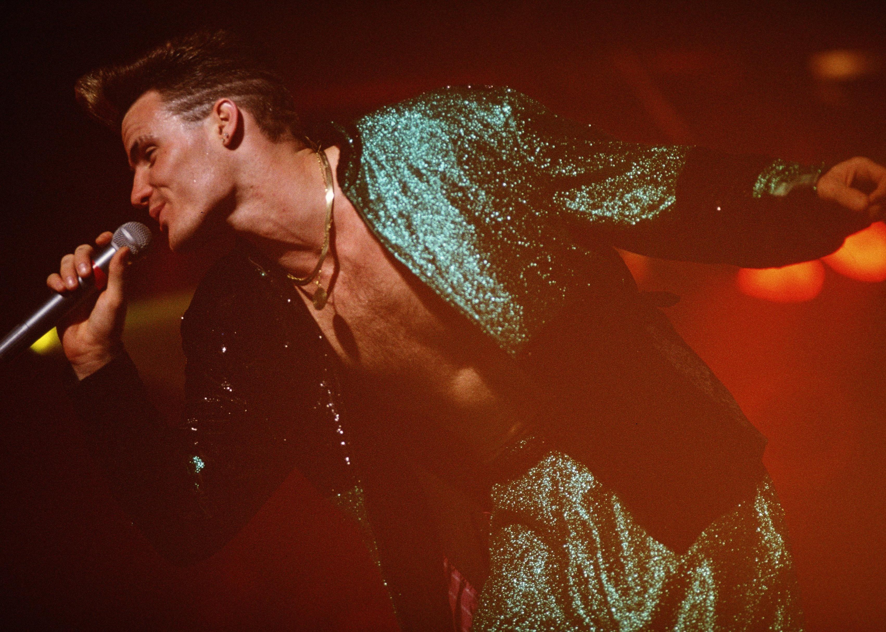 Vanilla Ice performs on stage.