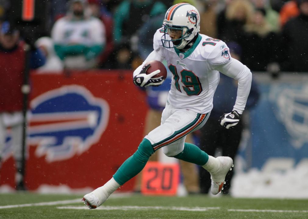 Ted Ginn Jr. #19 of the Miami Dolphins runs with the ball.