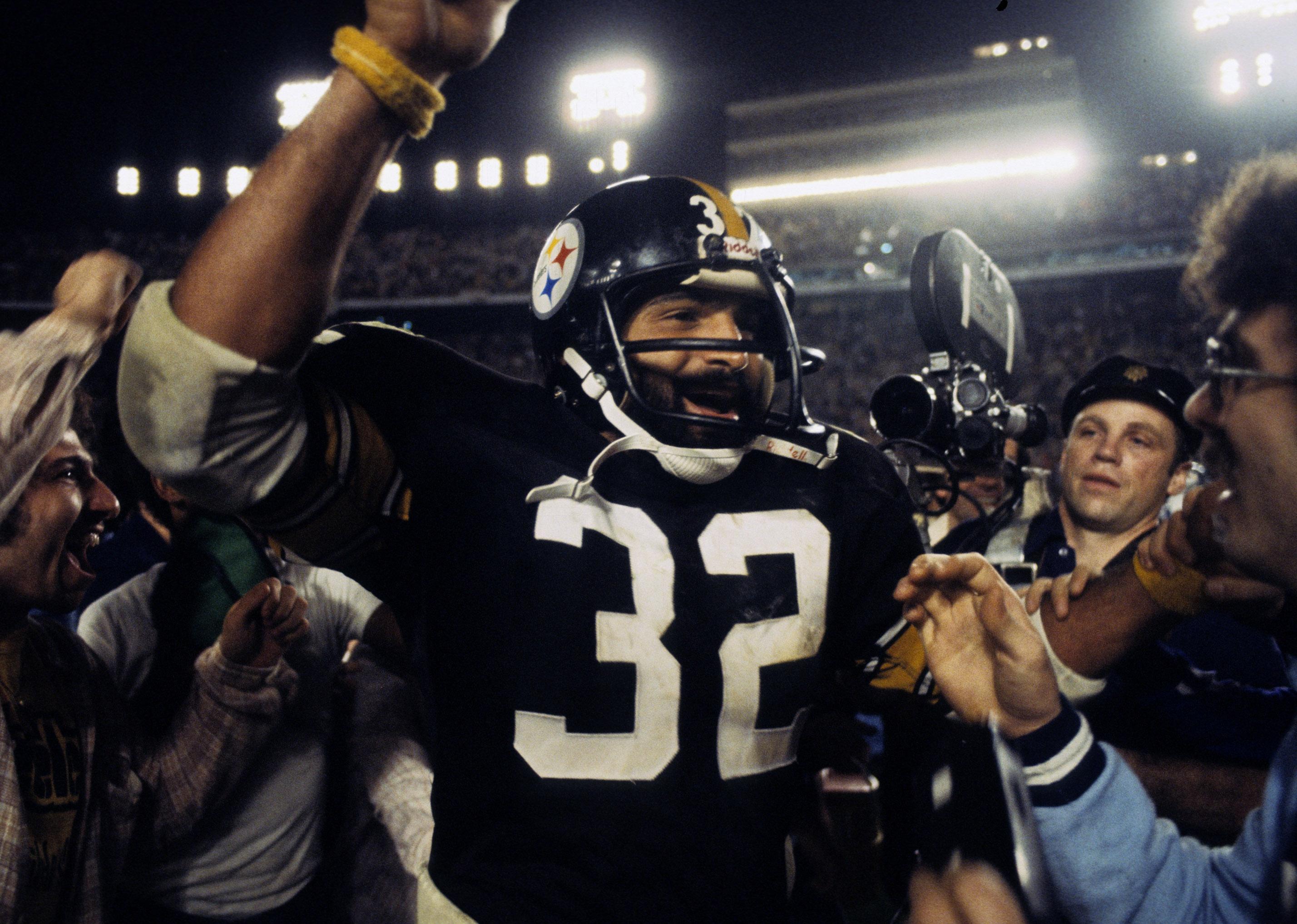 Franco Harris leaves the field following the Steelers victory over the Dallas Cowboys in Super Bowl XIII.