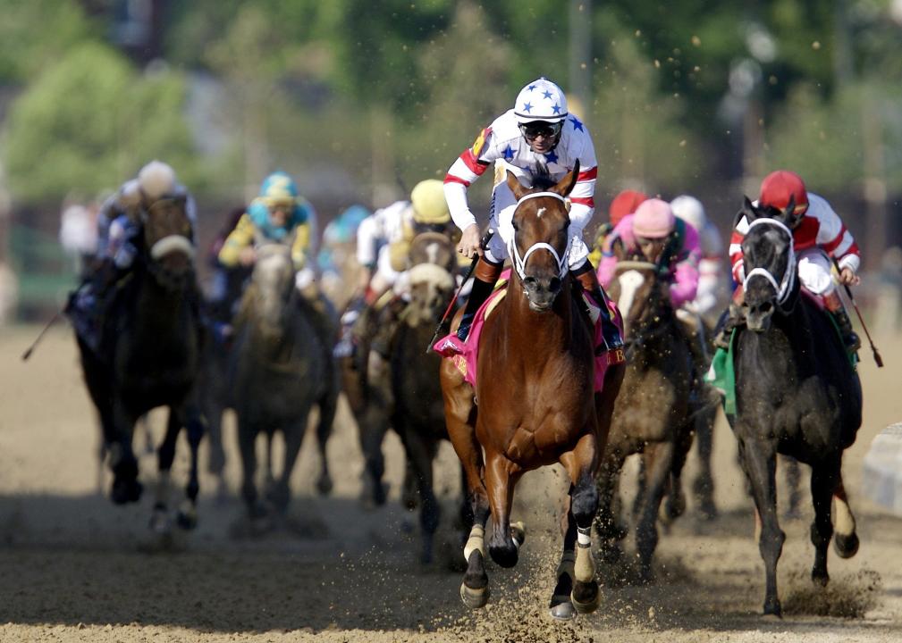 Kent Desormeaux crosses the finish line of the 134th Kentucky Derby