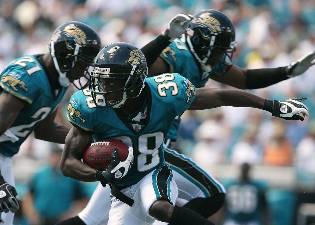 Punt returner Brian Witherspoon #38 of the Jacksonville Jaguars looks for room to run.