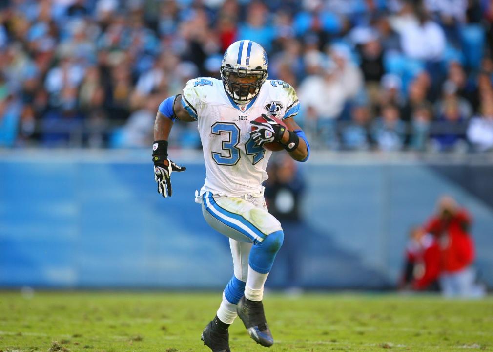 Kevin Smith #34 of the Detroit Lions runs with the ball.