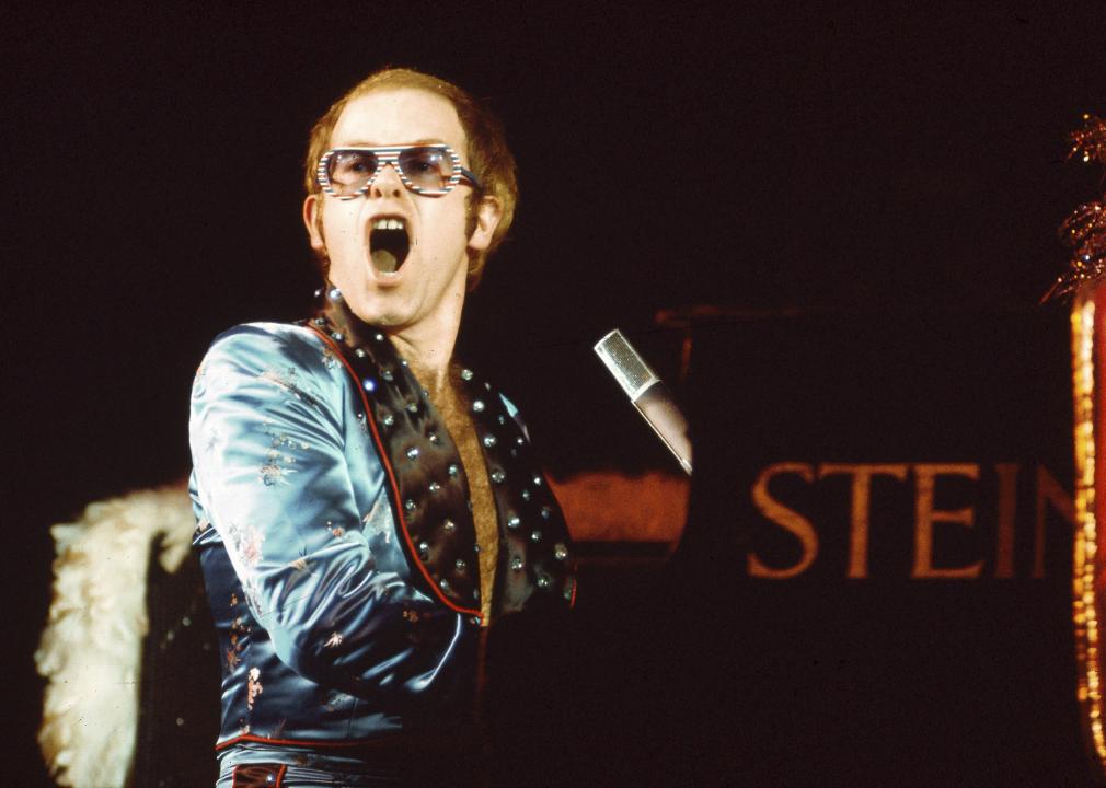 Elton John at the piano.