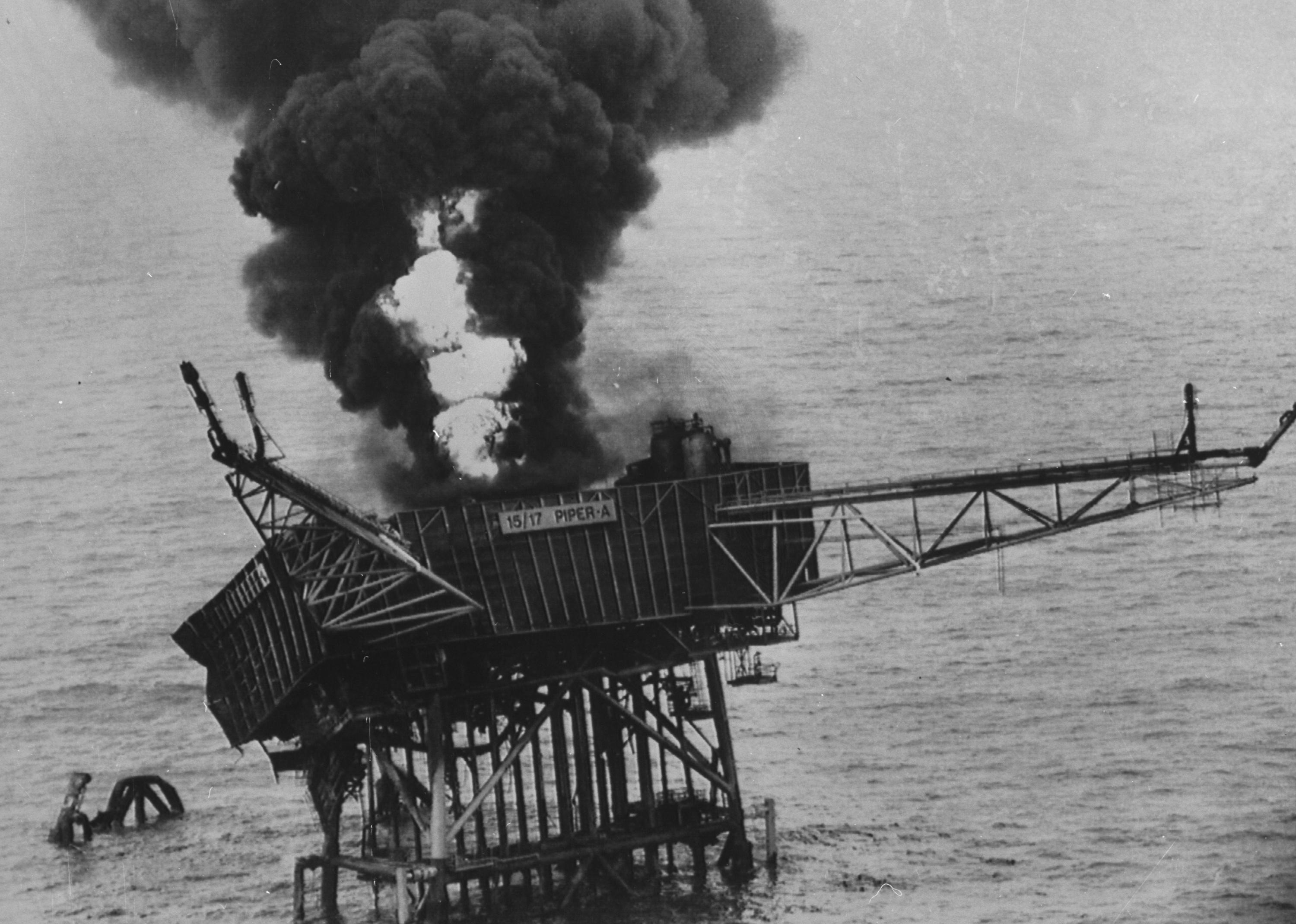 Smoke plumes from the Piper Alpha oil production platform.