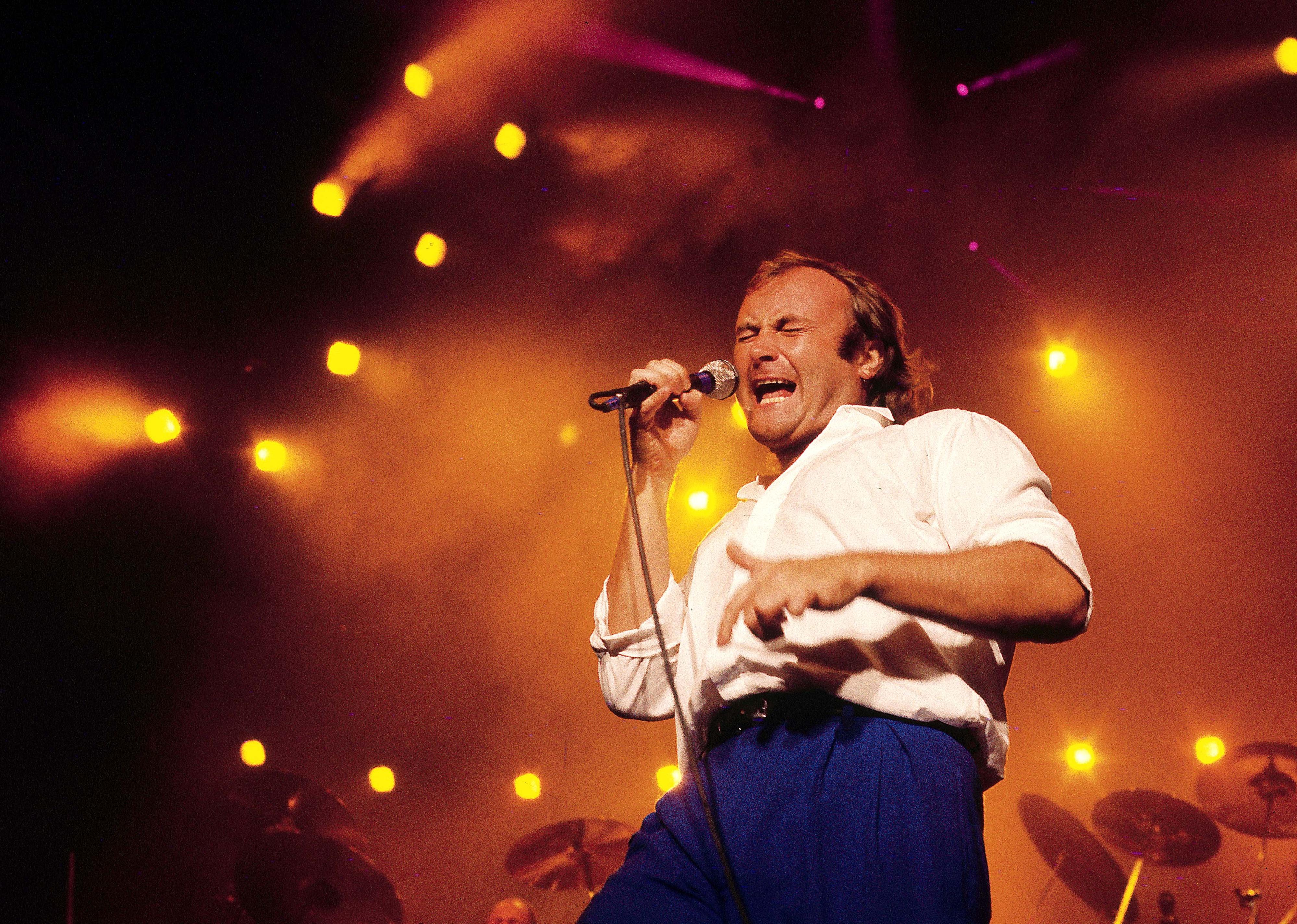 Phil Collins performing live on stage in Sydney, Australia.