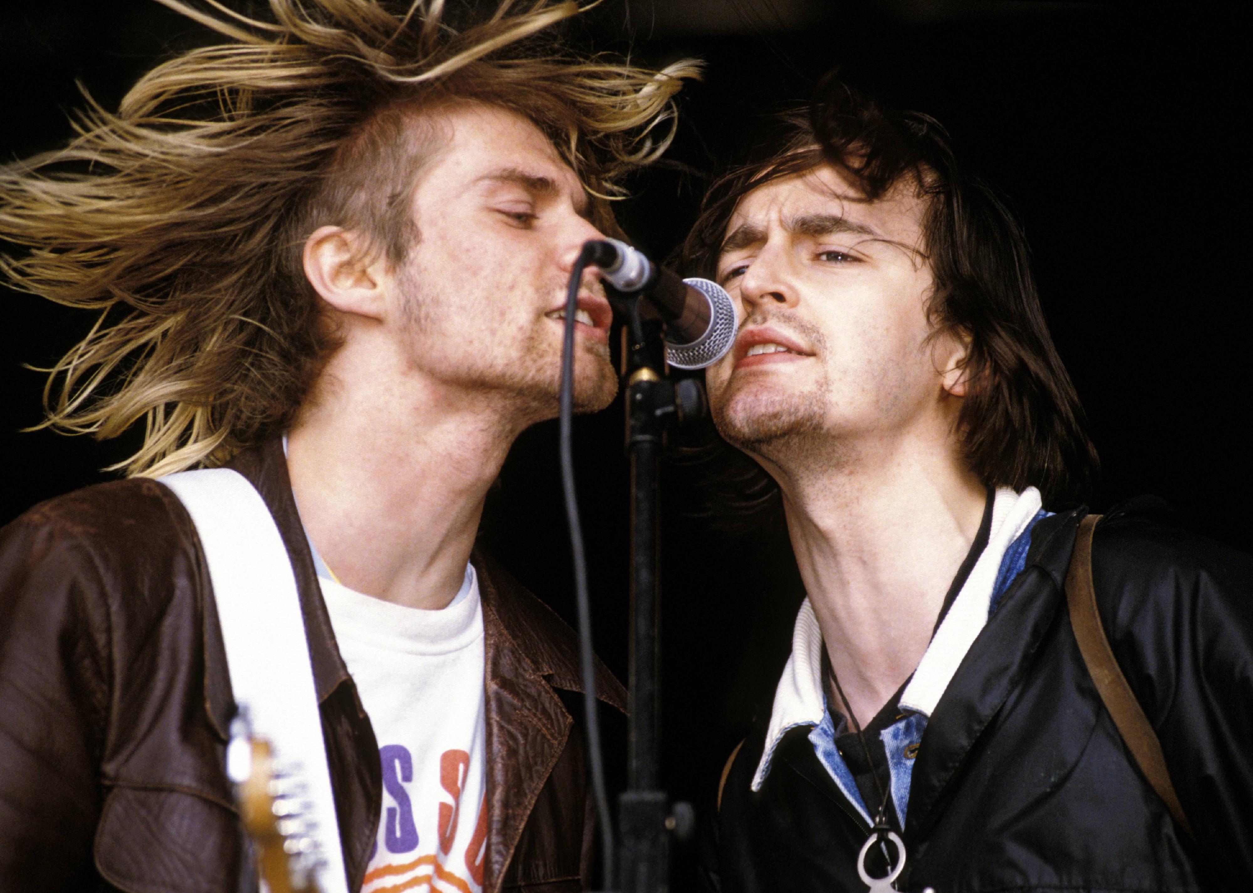 Kurt Cobain with Eugene Kelly performing live onstage.