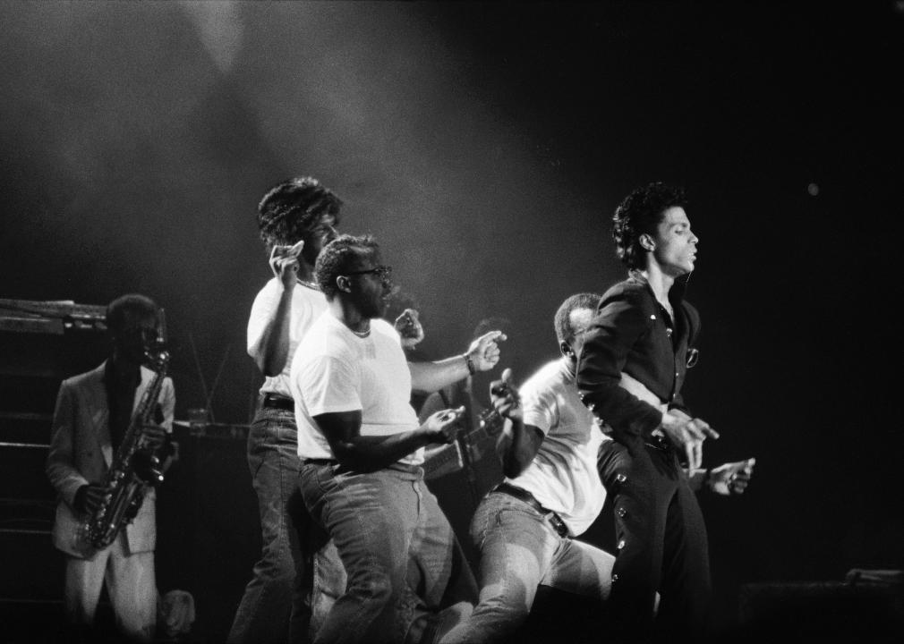 Prince performing onstage.