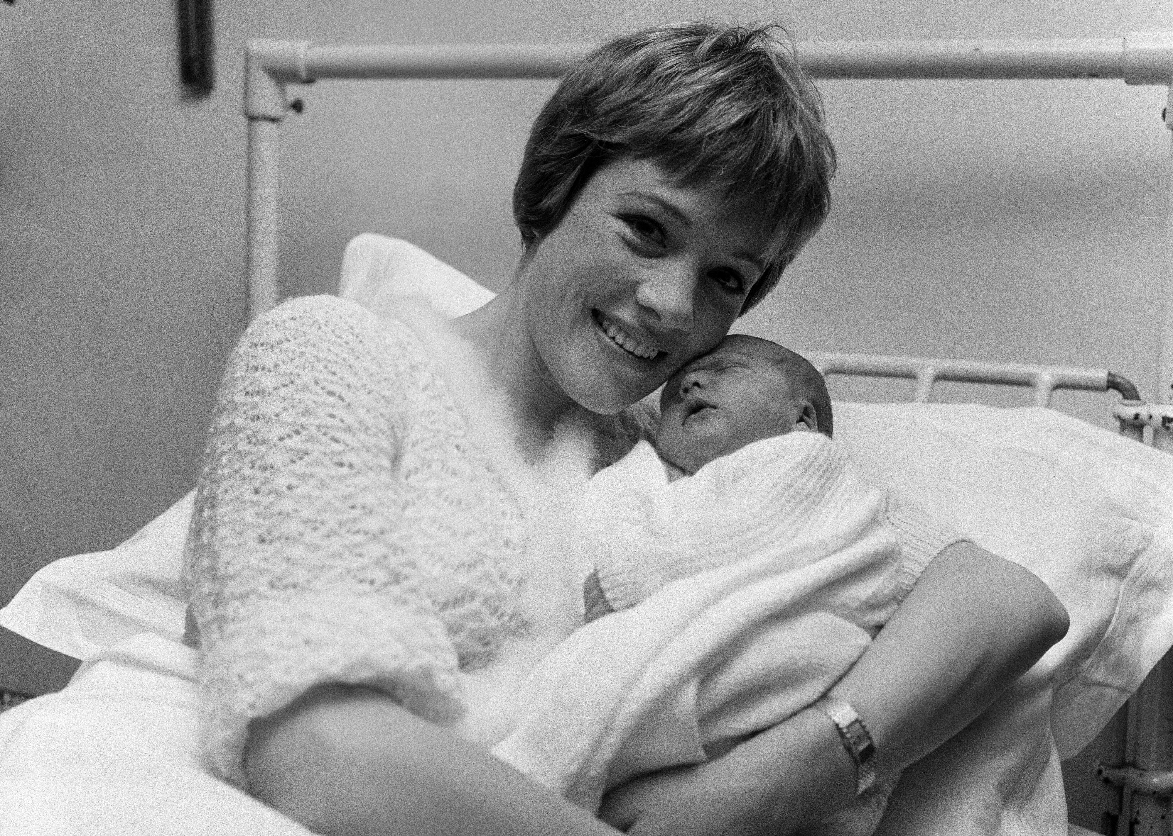 Julie Andrews of My Fair Lady fame in the London Clinic with her new daughter.