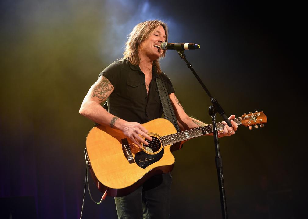 Keith Urban performs onstage during the Bobby Bones & The Raging Idiots' Million Dollar Show.