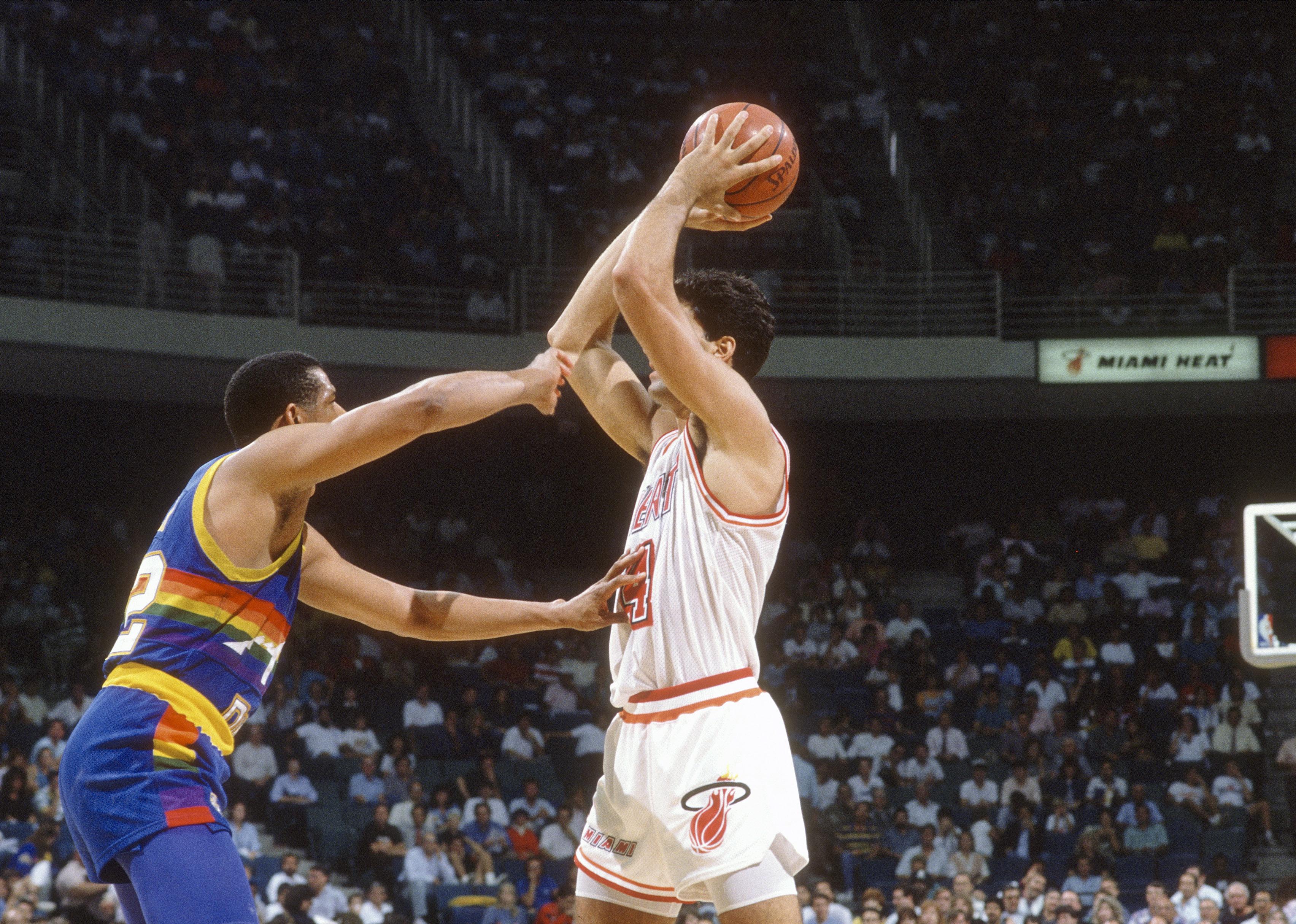 Rony Seikaly ready to pass the ball during an game at the Miami Arena.