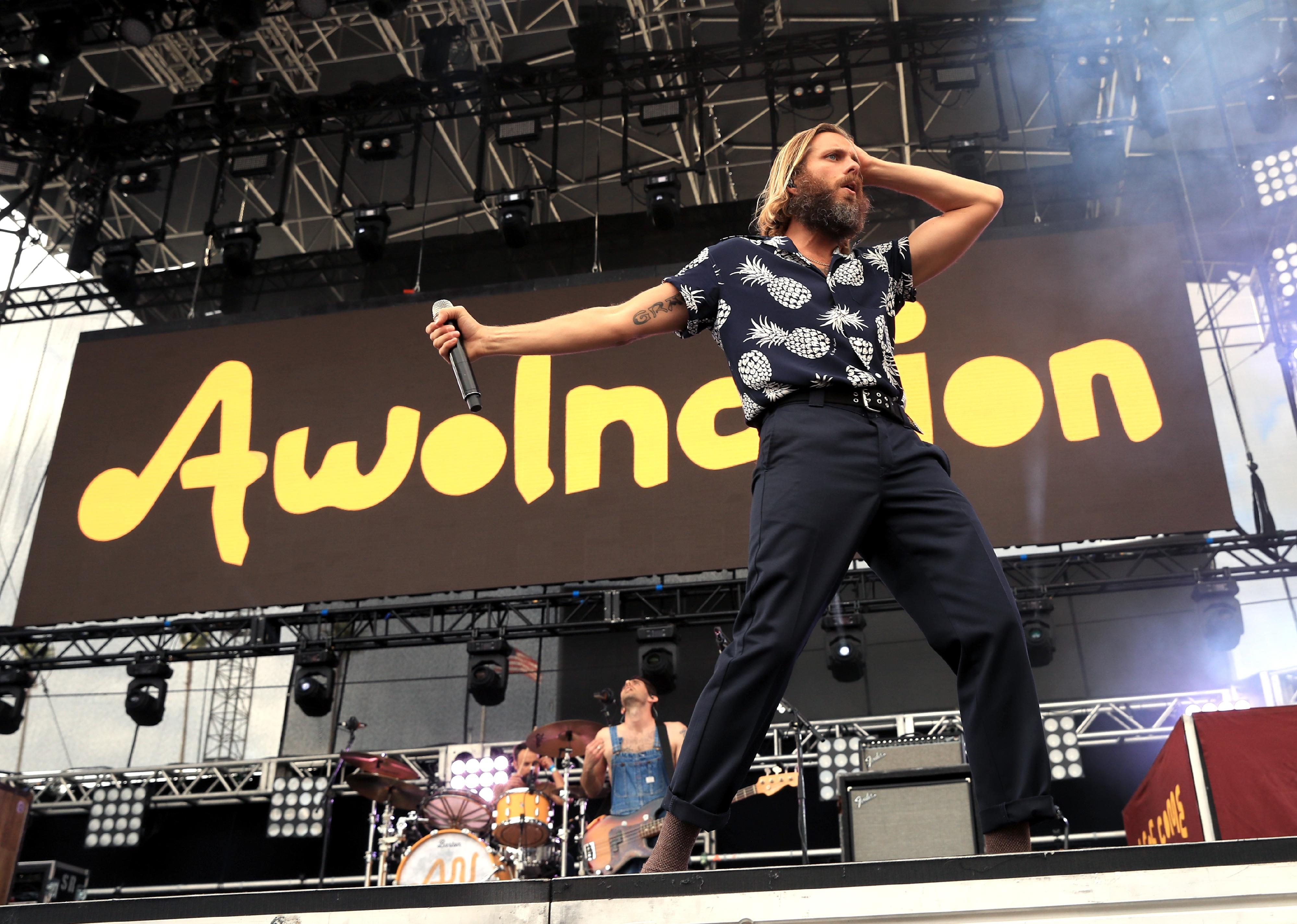 AWOLNATION performing onstage.