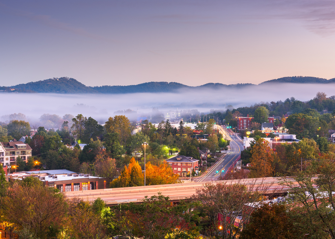Aerial view of fog rolling over Asheville.