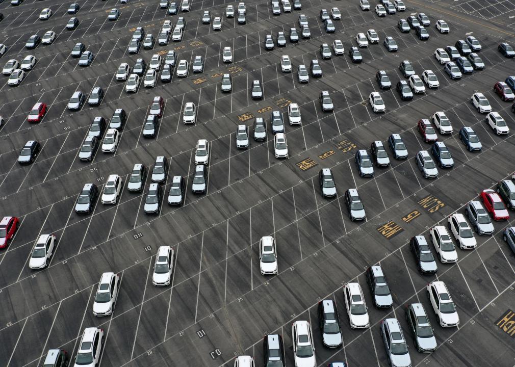 An aerial view of brand new Subaru cars in a half-empty storage lot at Auto Warehouse Co. in California in 2021.