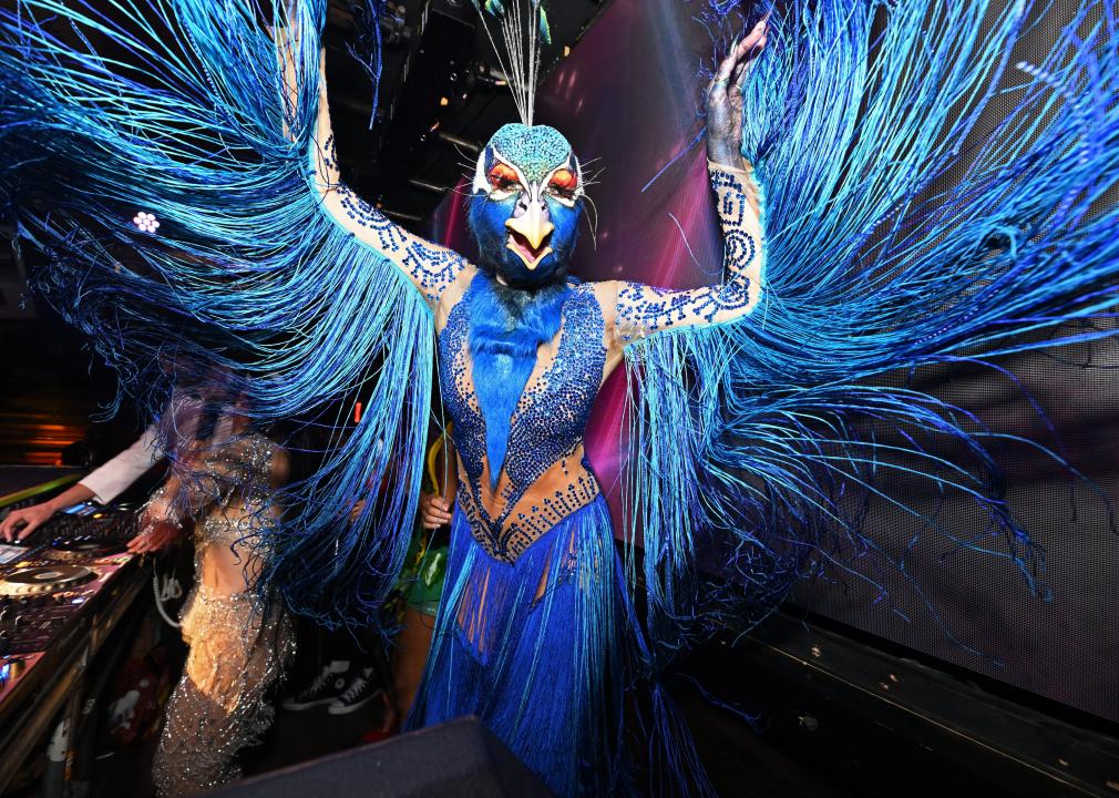 Heidi Klum dressed as a peacock.