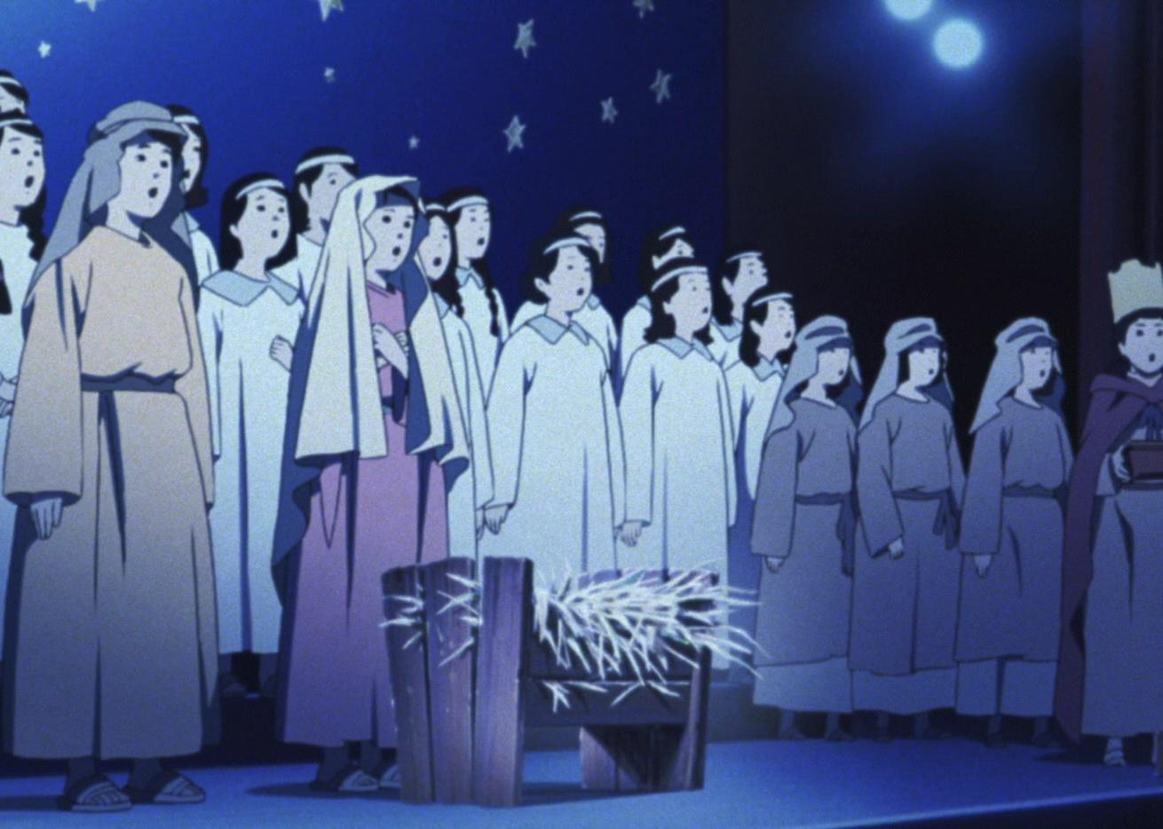 An animation of a choir singing a holiday song with a baby bed of hay in the front.