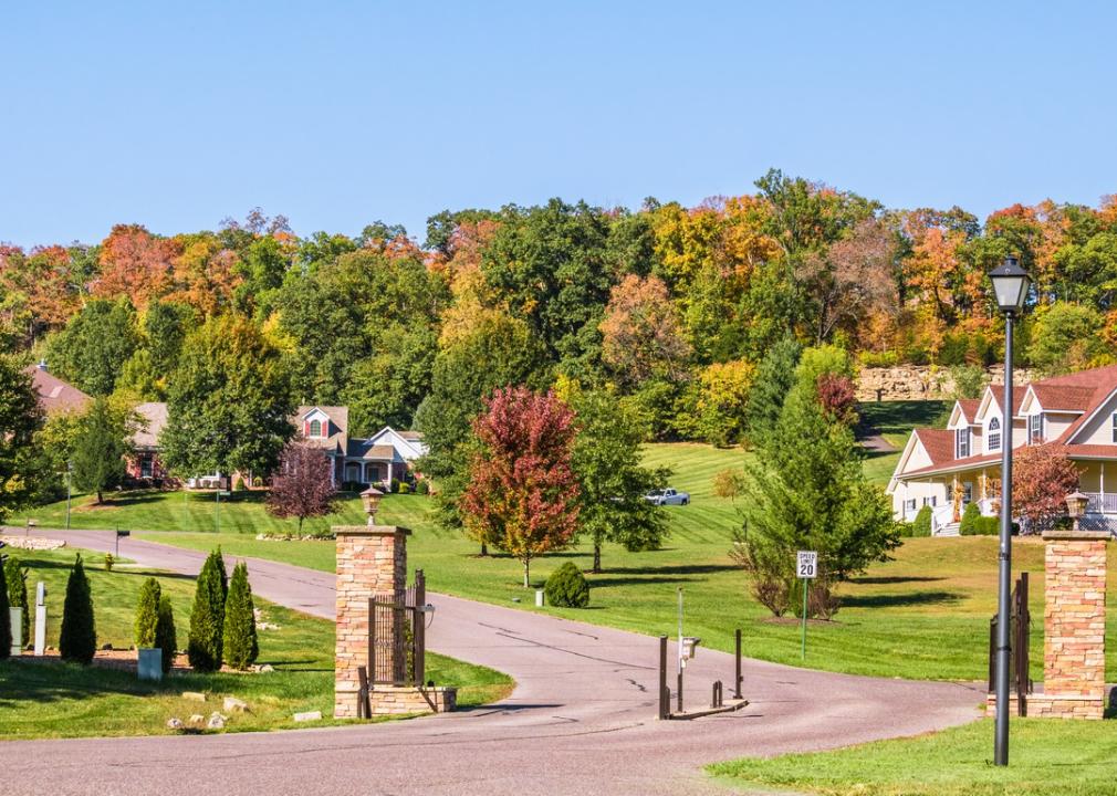 Entrance into a well-manicured rural Missouri neighborhood in Fall.